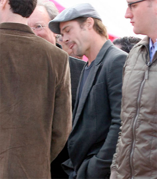 Illustration for article titled Brad's Sleepy Eyes; Johnny's Scuffed Shoes; Angelina & Maddox